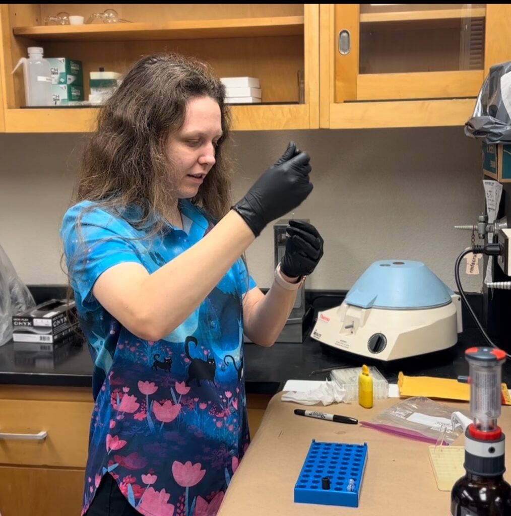 Woman doing forensic testing in a lab