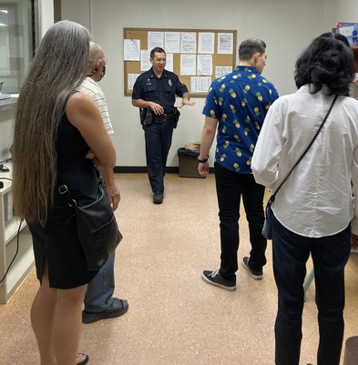 Officer giving tour at Hilo station