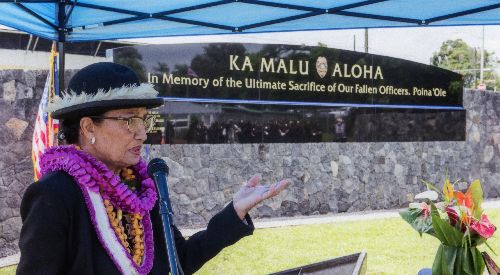 Momi Cazimero speaking at the unveiling of the police memorial wall