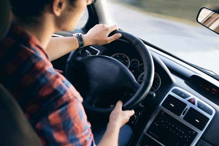 Man driving a car